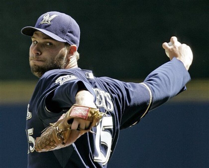 Milwaukee Brewers starting pitcher Ben Sheets throws during the third inning of a baseball game against the New York Mets on Monday, Sept. 1, 2008, in Milwaukee. (AP Photo/Morry Gash)