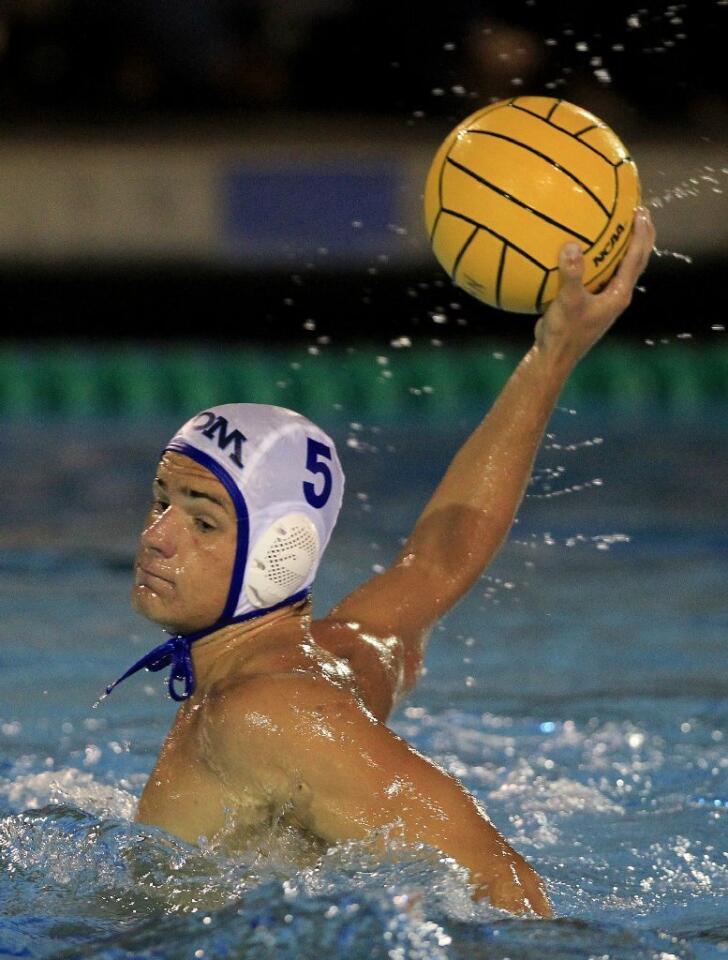 Corona del Mar High's Charlie Rodosky (5) aims for the net during the second half against Newport Harbor in the Battle of the Bay game on Saturday.