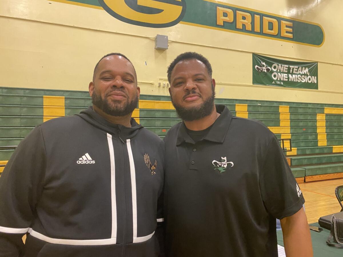 Narbonne coach Anthony Hilliard with King Drew coach Lloyd Webster.