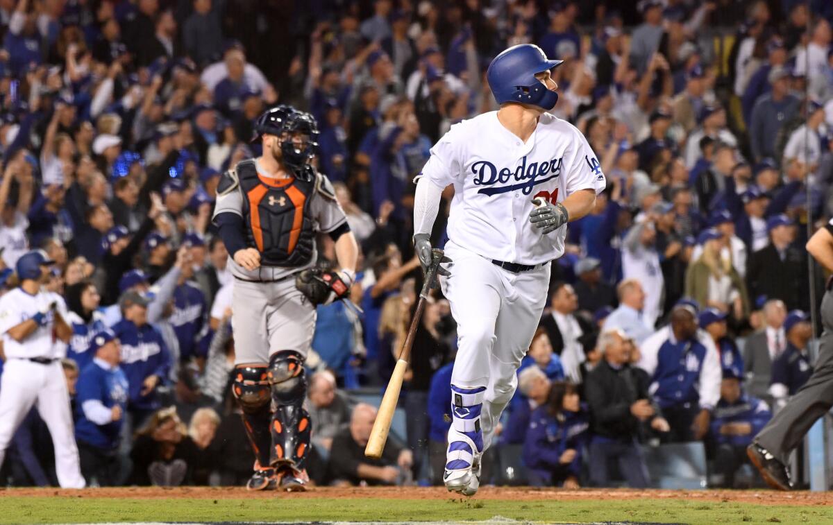 Joc Pederson hits a solo solo home run in the seventh inning against the Houston Astros in Game 6 of the World Series at Dodger Stadium on Tuesday.