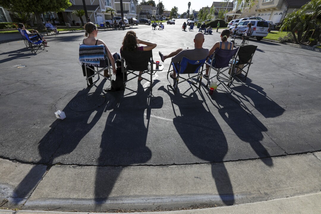 Two years ago, she competed on 'The Voice.' Now she's the
star of a coronavirus block party 4 Upland cul-de-sac concert