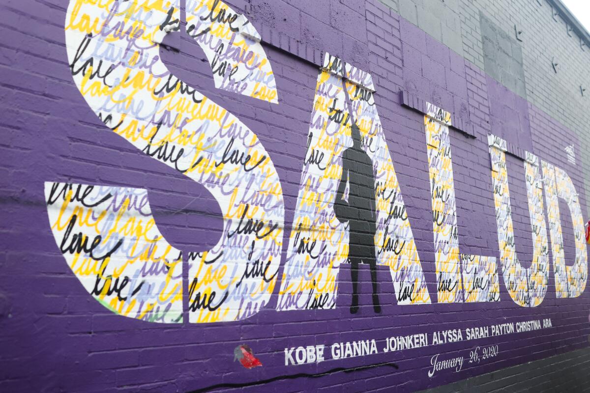 A Kobe Bryant mural that is titled 'Salud' is displayed outside of Dr. Ghalili Clinic & Urgent Care in South Los Angeles.