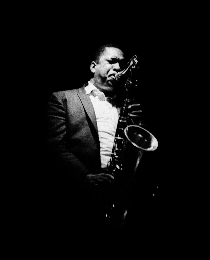 Jazz musician John Coltrane playing the saxophone