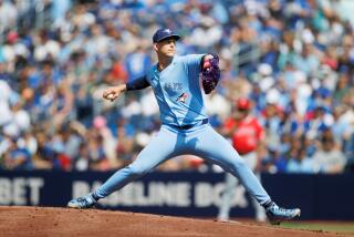 TORONTO, CANADA - AUGUST 24: Bowden Francis #44 of the Toronto Blue Jays pitches.