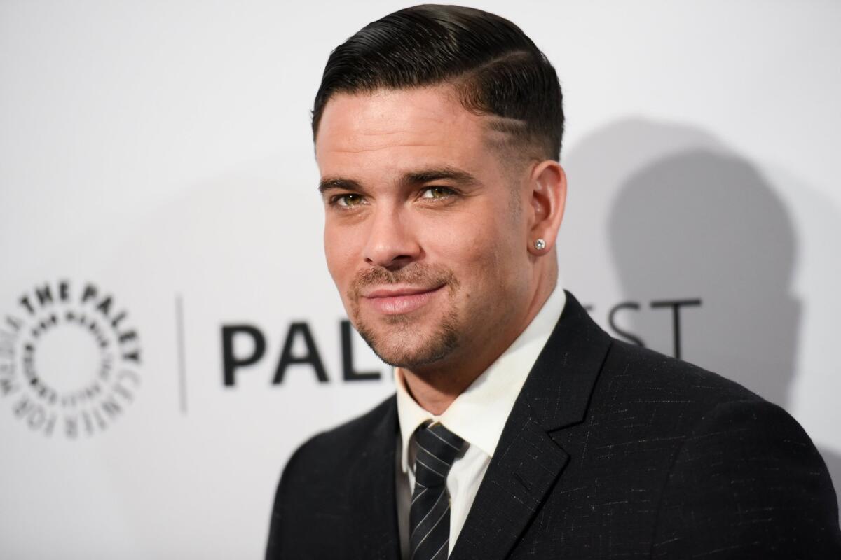 Mark Salling arrives at the Paleyfest at the Dolby Theatre in Los Angeles on March 13.