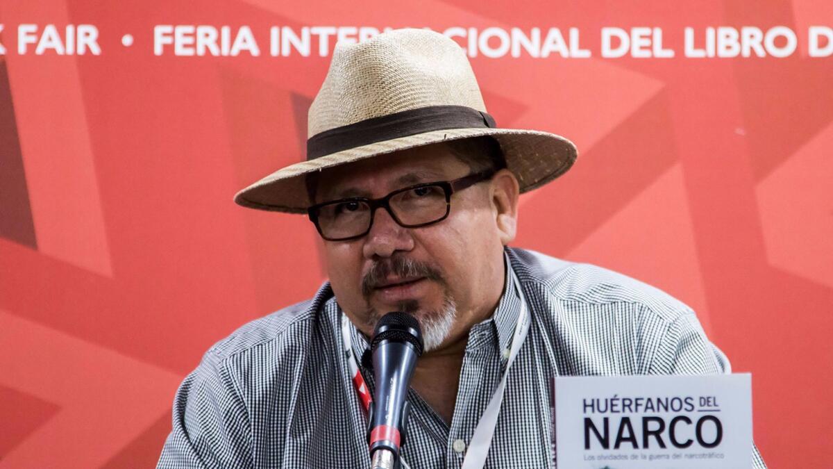 Javier Valdez speaks about his book "Huerfanos del Narco" at the International Book Fair in Guadalajara, Mexico, in November.