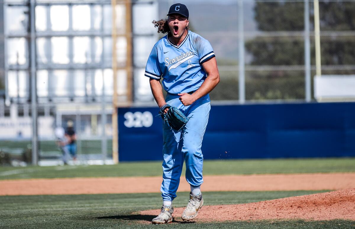 Boston Bateman of Camarillo gets excited after a fourth-inning strikeout with the bases loaded against Dos Pueblos.
