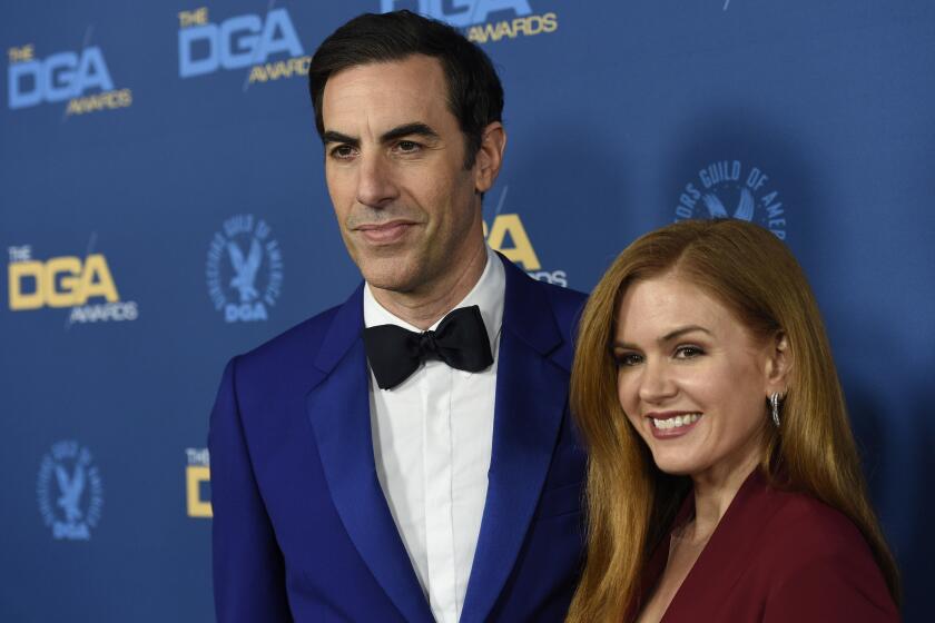 FILE Sacha Baron Cohen, left, and Isla Fisher arrive at the 71st annual DGA Awards at the Ray Dolby Ballroom on Saturday, Feb. 2, 2019, in Los Angeles. Cohen and Fisher say they filed for divorce last year after more than 20 years as a couple. The English “Borat” star and the Australian “Wedding Crashers” actor who married in 2010 announced their split Friday, April 5, 2024, on Instagram. (Photo by Chris Pizzello/Invision/AP, File)