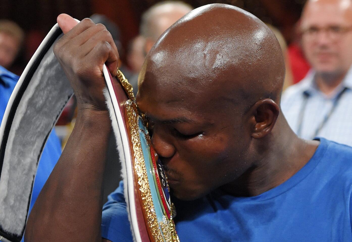Timothy Bradley kisses the belt after defeating Jessie Vargas in a welterweight boxing match for the interim WBO title, Saturday, June 27, 2015, in Carson, Calif. (AP Photo/Mark J. Terrill)