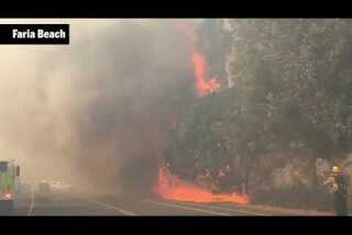 Fire pushes toward coast