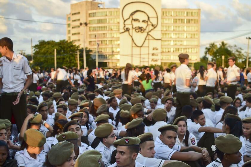 Students gather at Revolution Square to pay homage to late Cuban revolutionary leader Fidel Castro, in Havana, on November 29, 2016.