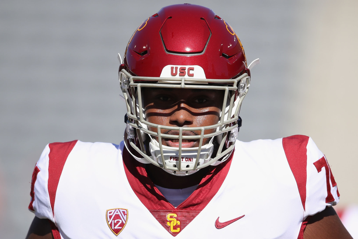 USC offensive lineman Courtland Ford warms up before a game.