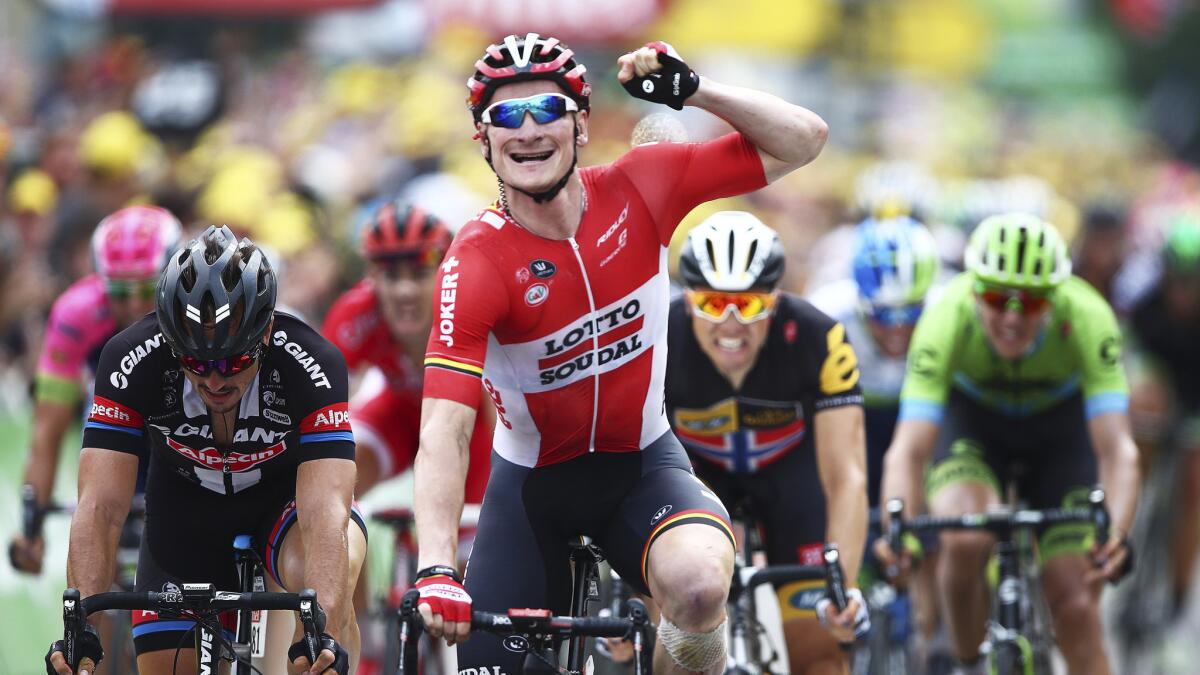Germany's Andre Greipel celebrates as he crosses the finish line to win the 15th stage of the Tour de France on Sunday.