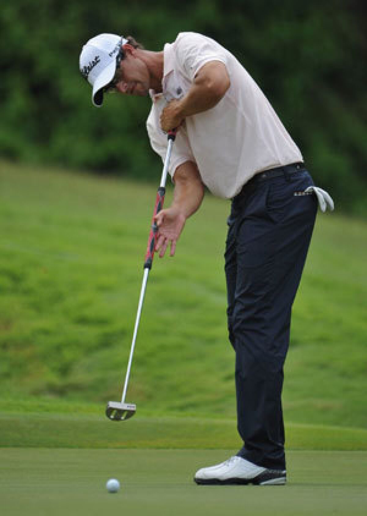 Adam Scott is one of the golfers who use a belly putter on the PGA Tour.