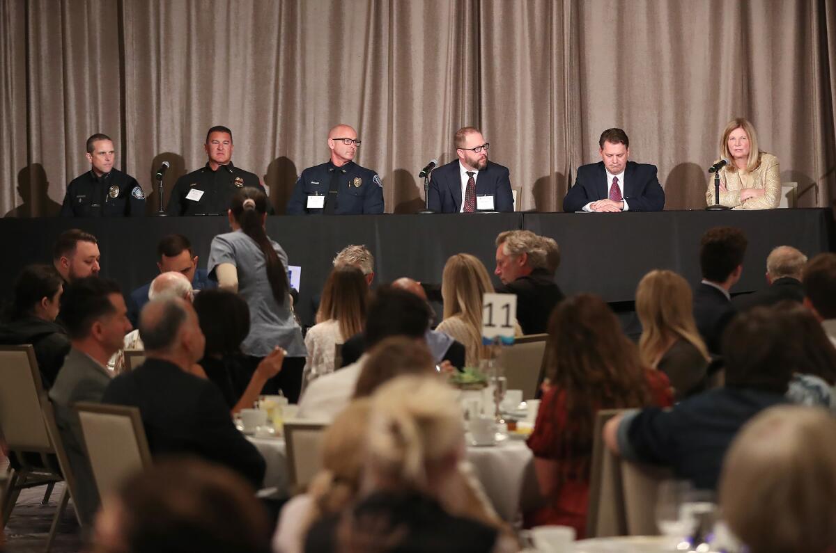 Laguna Beach officials sit on a panel during the Laguna Beach State of the City address at the Montage on Tuesday.