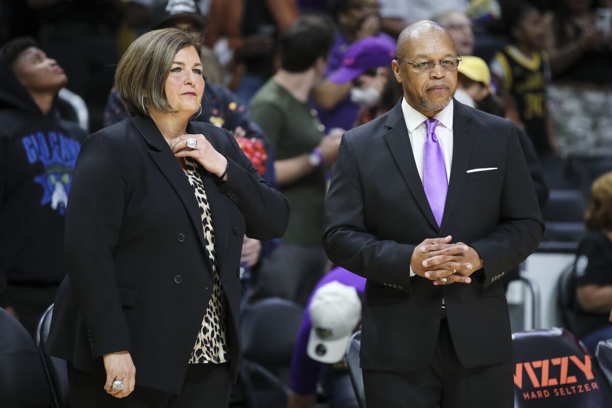 Sparks interim head coach Fred Williams and assistant coach Latricia Trammell look on ahead of a game against Las Vegas.