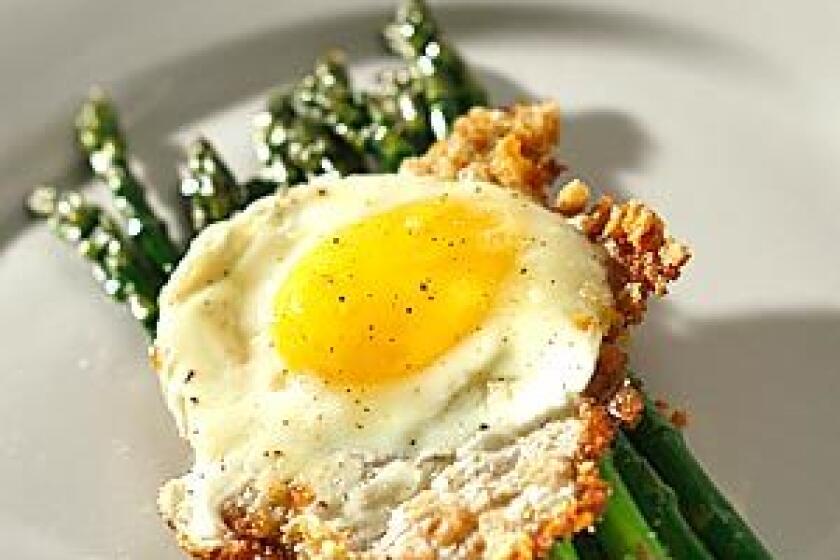 Fried eggs with asparagus and bread crumbs can make a simple dinner seem fancy. Common ingredients work well with eggs.