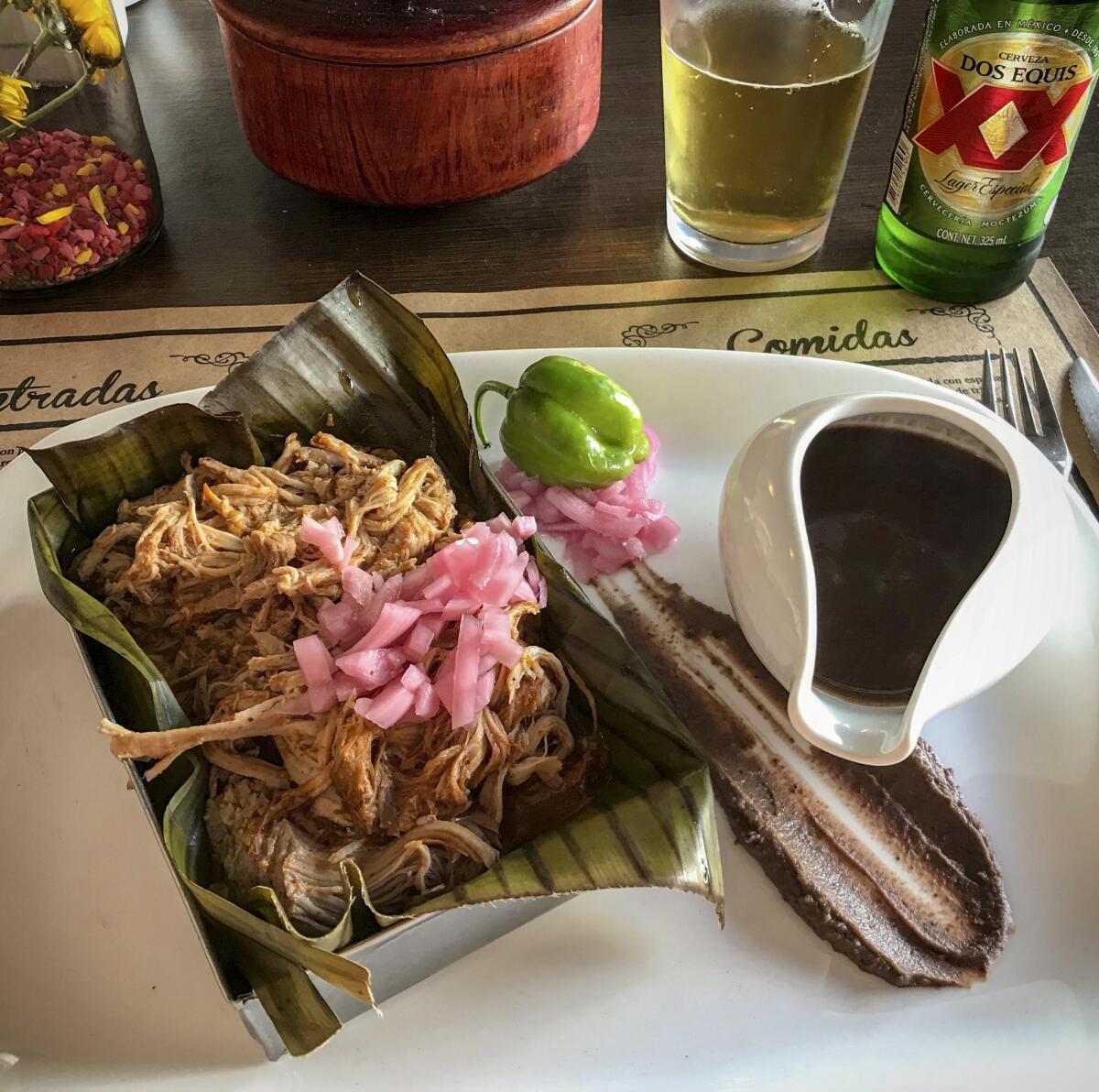 The iconic Yucatecan dish cochinita pibil at Manjar Blanco restaurant.