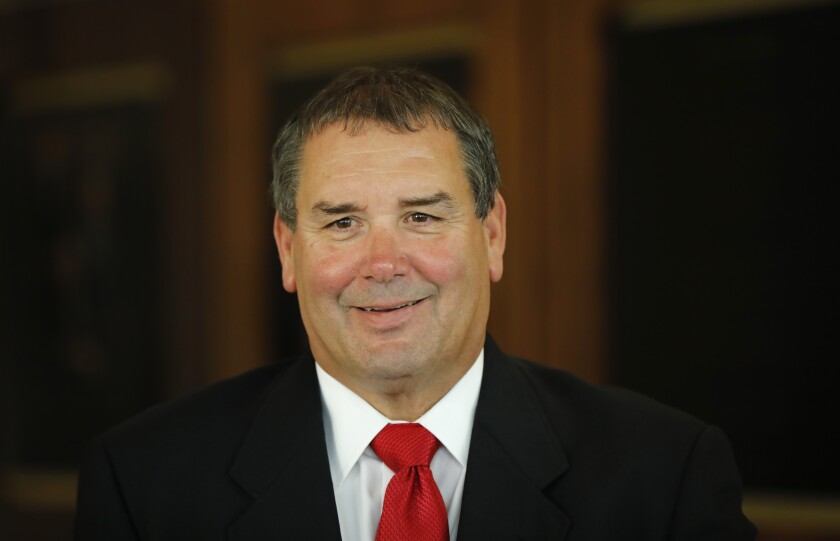 Brady Hoke was named the new coach of the San Diego State football team, replacing a retiring Rocky Long.