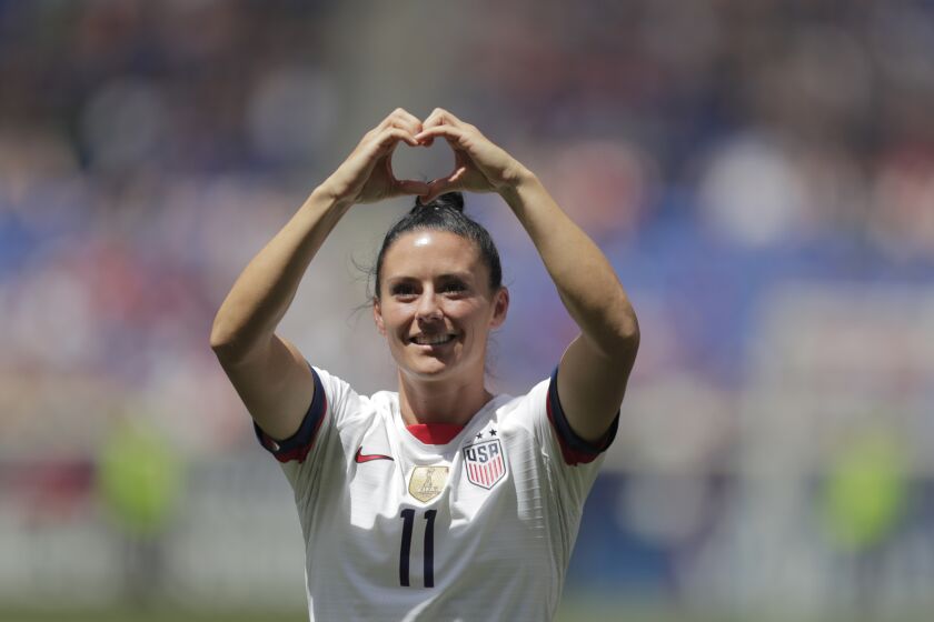 FILE - United States defender Ali Krieger is introduced during a send-off ceremony ahead of the FIFA Women's World Cup after an international friendly soccer match against Mexico, Sunday, May 26, 2019, in Harrison, N.J. The U.S. won 3-0. Ali Krieger has decided to retire at the end of this season after a professional soccer career that has stretched some 16 years. Krieger announced her impending retirement on Thursday, March 23, 2023.(AP Photo/Julio Cortez, File)