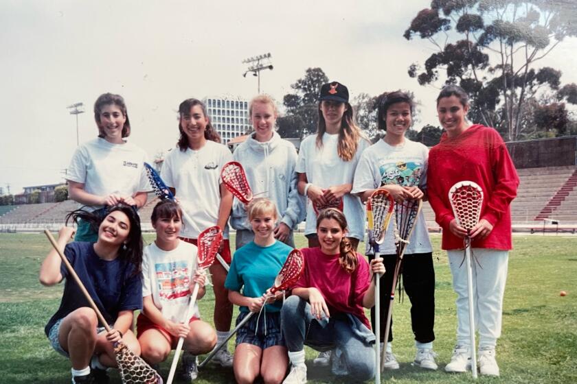 Sylvia Busby, bottom left, in 1990 with the first La Jolla High School lacrosse team, 