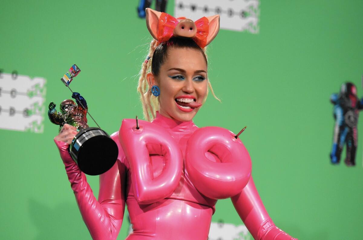 Miley Cyrus in the press room at the MTV Video Music Awards at the Microsoft Theater on Aug. 30, 2015, in Los Angeles.