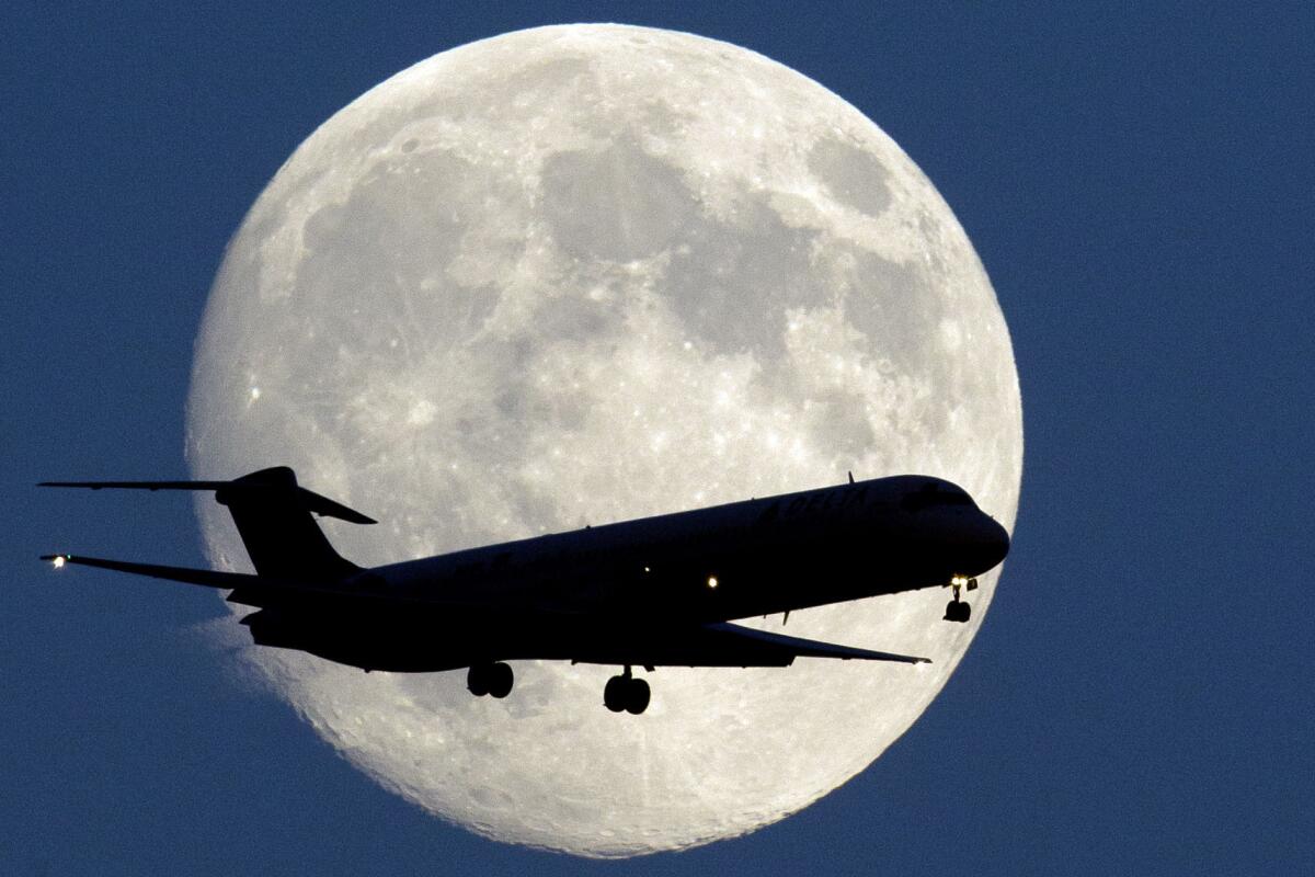 Flying has been the subject of plenty of literature, but what about the way we fly now? Above, a plane makes its approach Sept. 7 to Philadelphia International Airport.