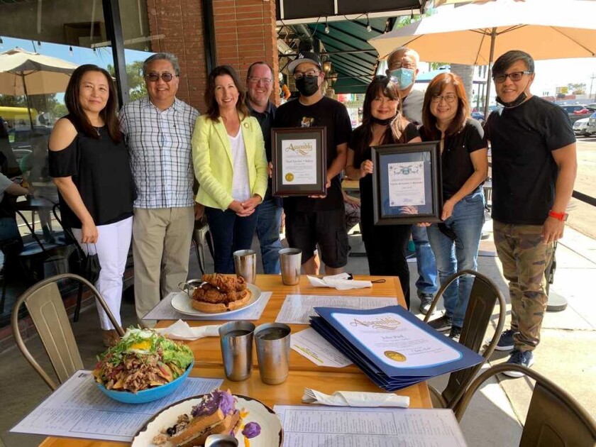 Assemblywoman Cottie Petrie-Norris, Costa Mesa Mayor John Stephens and culinary staff at Toast Kitchen + Bakery.