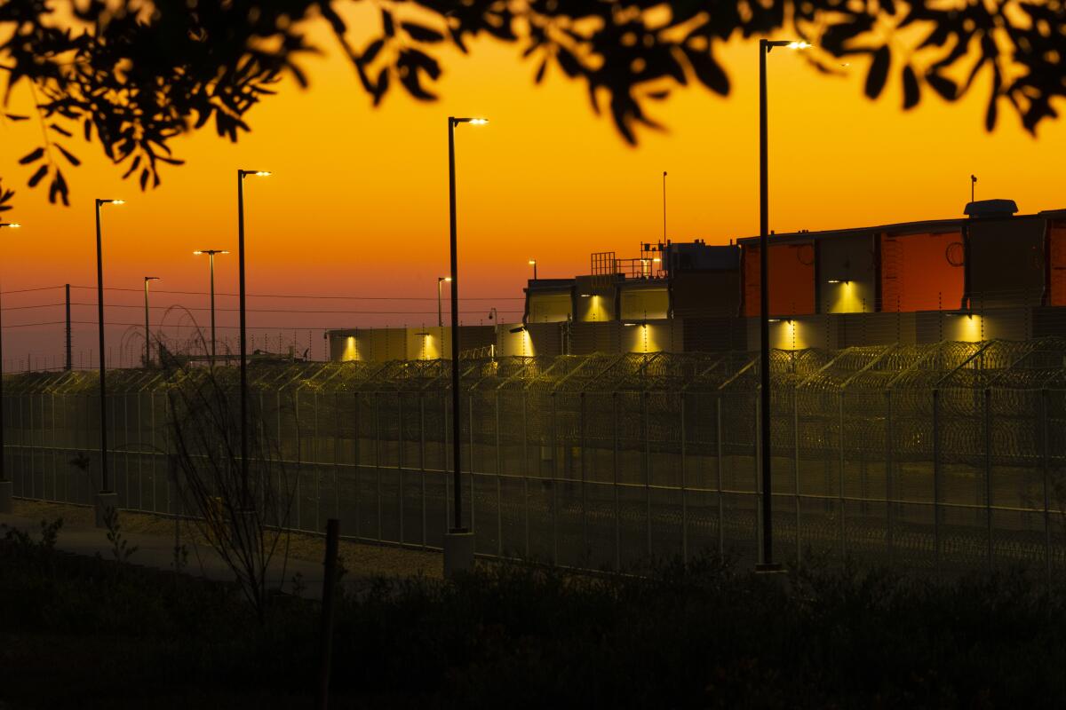 Evening view of exterior of the Otay Mesa Detention Center