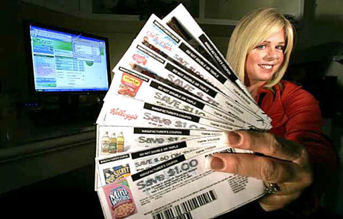 LET'S FIND A DEAL: Grocery Game's Teri Gault has taken coupon clipping to new heights. "I love a bargain," she says.