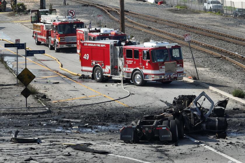 Wilmington, CA - February 15: Aerial view of truck explosion where several firefighters were injured, at least two critically, in an explosion involving a truck with pressurized cylinders in Wilmington Thursday, Feb. 15, 2024. Firefighters were sent to the 1100 block of North Alameda Street shortly before 7 a.m., according to Nicholas Prange of the Los Angeles Fire Department. ``Several other injured are being evaluated on scene, awaiting additional ambulances to arrive -- (an) estimated seven total firefighters,'' Prange said.(Allen J. Schaben / Los Angeles Times)