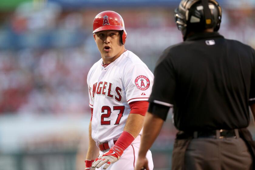 Angels outfielder Mike Trout is flummoxed by a called third strike early in the game against the Yankees.
