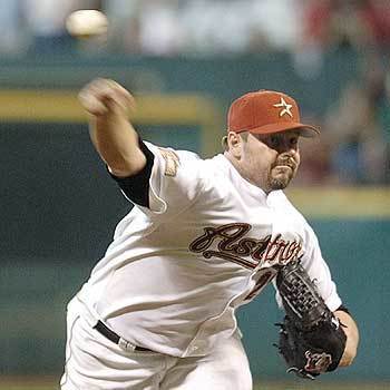 Houston Astros pitcher Roger Clemens delivers a strike to St. Louis Cardinals Roger Cedeno to end the 7th inning.