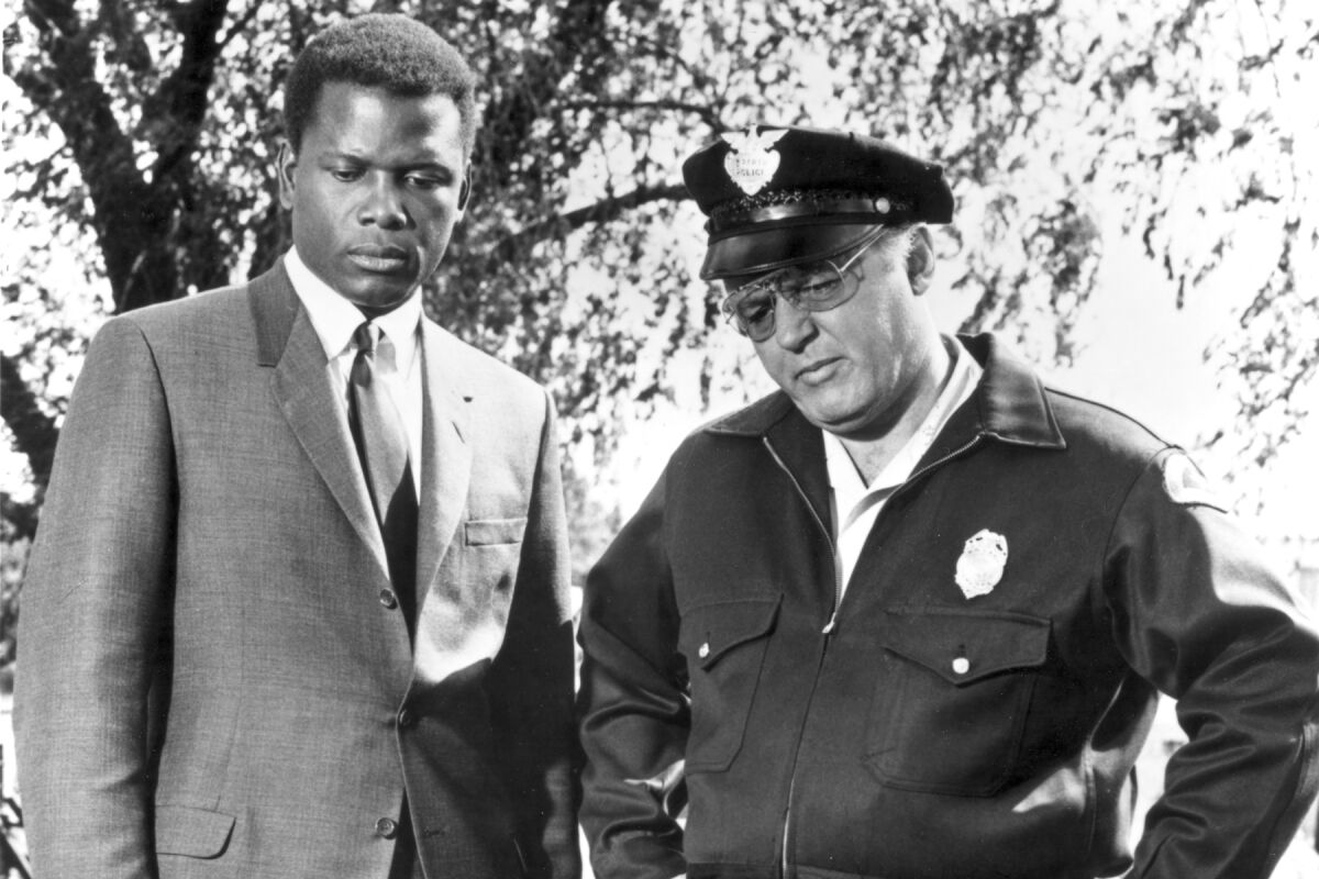 Sidney Poiter and Rod Steiger in the movie "In the Heat of the Night" 