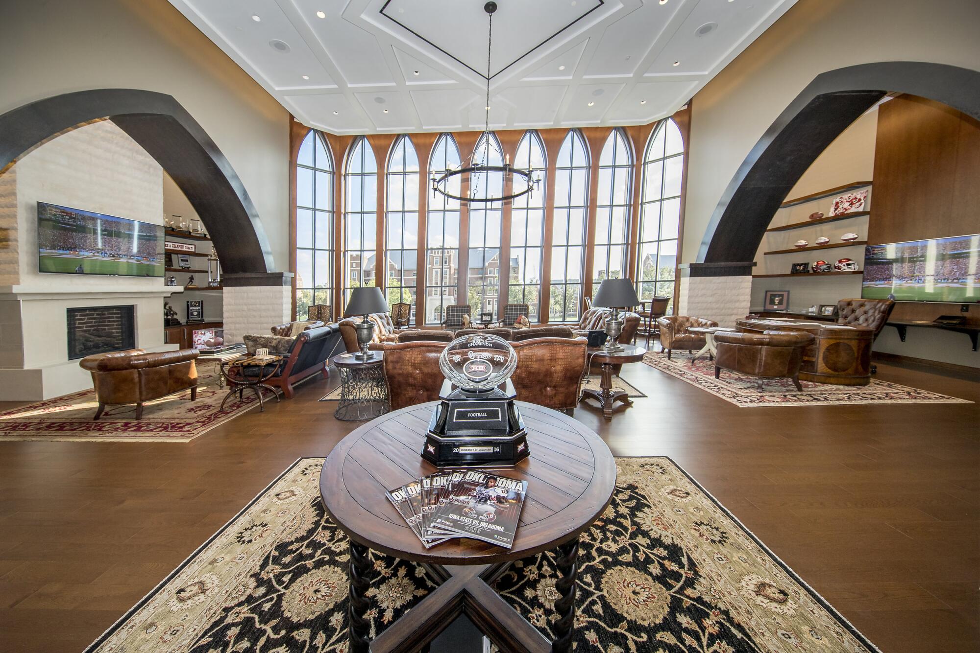 Oklahoma coach Lincoln Riley inherited an opulent office that was custom designed for former coach Bob Stoops