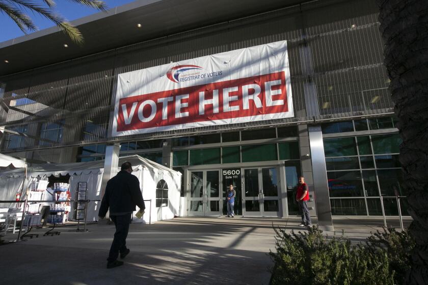 Early morning voters walked in to the Registrar of Voters office in Kearny Mesa on election day, Tuesday March 3, 2020.