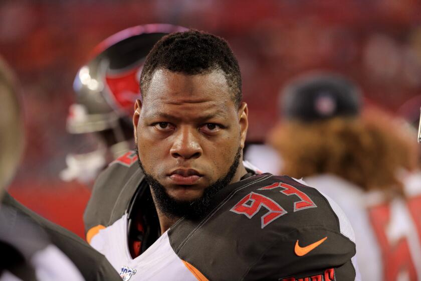 TAMPA, FLORIDA - AUGUST 16: Ndamukong Suh #93 of the Tampa Bay Buccaneers looks on against the Miami Dolphins in the second half during the preseason game at Raymond James Stadium on August 16, 2019 in Tampa, Florida. (Photo by Mike Ehrmann/Getty Images)