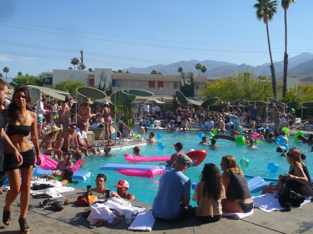 People party poolside at the Palm Springs Ace Hotel at a Coachella gone by.