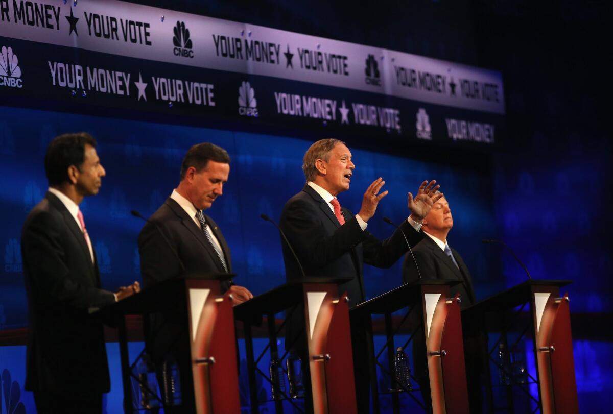 BOULDER, CO - OCTOBER 28: Presidential candidates Louisiana Governor Bobby Jindal (L-R), Rick Santorum, George Pataki, and Sen. Lindsey Graham (R-SC) take part in the CNBC Republican Presidential Debate at University of Colorado's Coors Events Center October 28, 2015 in Boulder, Colorado. Fourteen Republican presidential candidates are participating in the third set of Republican presidential debates. (Photo by Justin Sullivan/Getty Images) ** OUTS - ELSENT, FPG, CM - OUTS * NM, PH, VA if sourced by CT, LA or MoD **