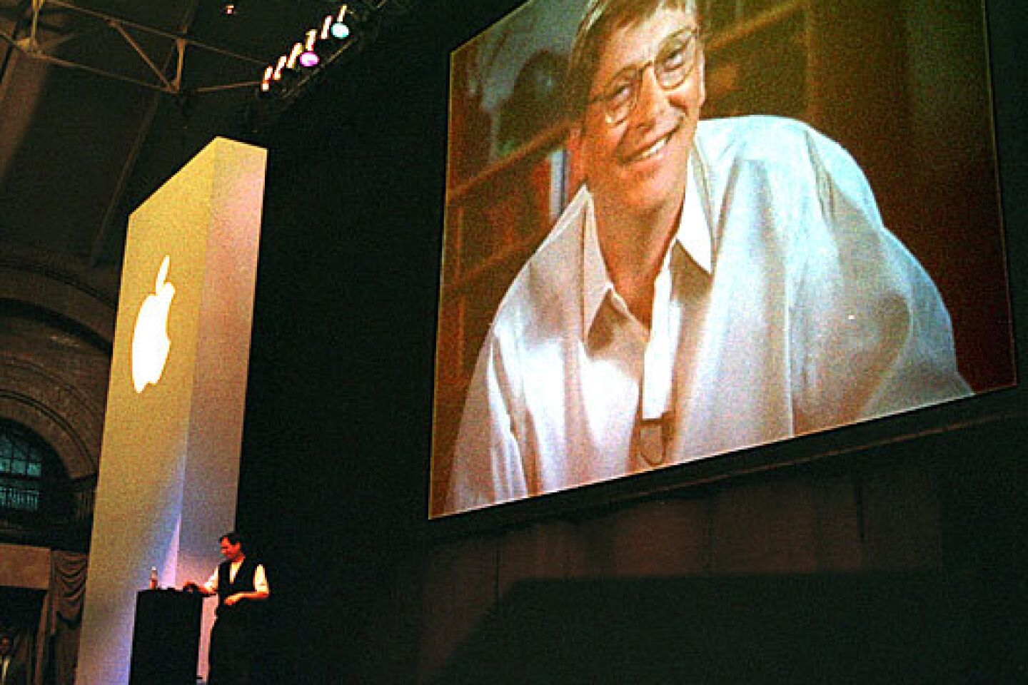 The industry was shocked when Jobs announced that the struggling Apple had forged an alliance with its sworn enemy, Microsoft. At the 1997 Macworld Expo trade show, Microsoft Chief Executive Bill Gates chimes in via satellite.