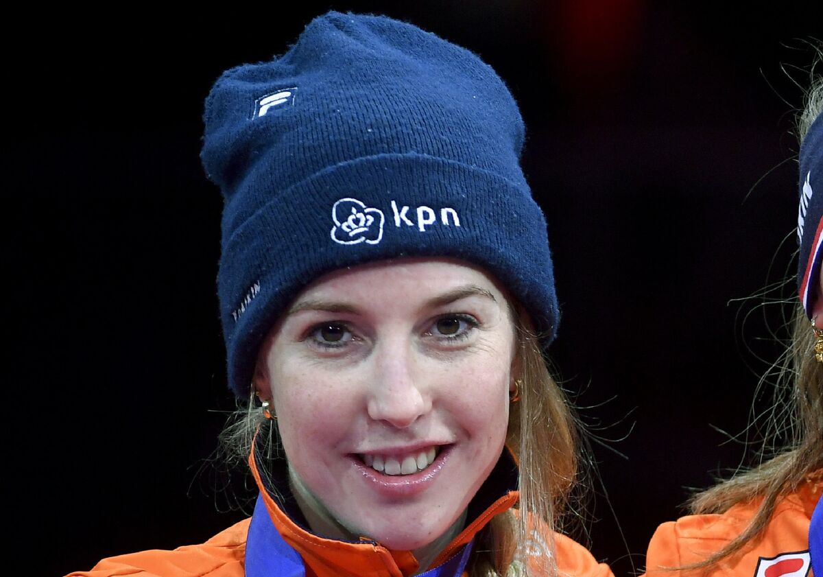 FILE - In this Sunday, Jan. 26, 2020 file photo, silver medal winning Lara van Ruijven smiles, during the medal ceremony of the women's 1,000m race of the ISU European Short Track Speed Skating Championships in Debrecen, Hungary. Dutch world champion short-track speedskater Lara van Ruijven died Friday, July 10, 2020 as a result of a complications from an autoimmune reaction, the national skating organization said. Van Ruijven was 27. (Zsolt Czegledi/MTI via AP, File)