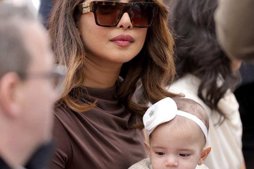 Priyanka Chopra and Malti Marie Chopra Jonas attend The Hollywood Walk of Fame star ceremony honoring The Jonas Brothers