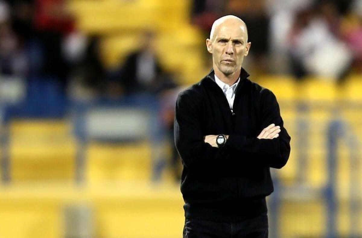 Egypt Coach Bob Bradley watches his players during an exhibition against Qatar in Doha earlier this year.