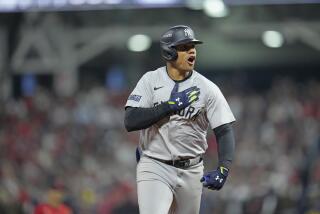 New York Yankees' Juan Soto celebrates after hitting a three-run home run agains.