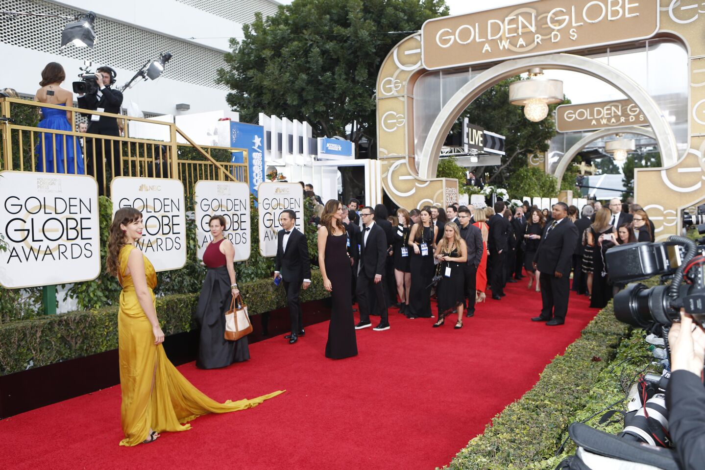 Lola Kirke poses on the red carpet at the 73rd Golden Globe Awards show at the Beverly Hilton Hotel.