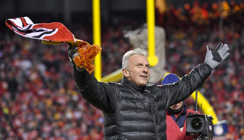 Hall of Fame quarterback Joe Montana fires up the crowd during a break in the AFC championship game on Jan. 20 at Arrowhead Stadium in Kansas City, Mo.