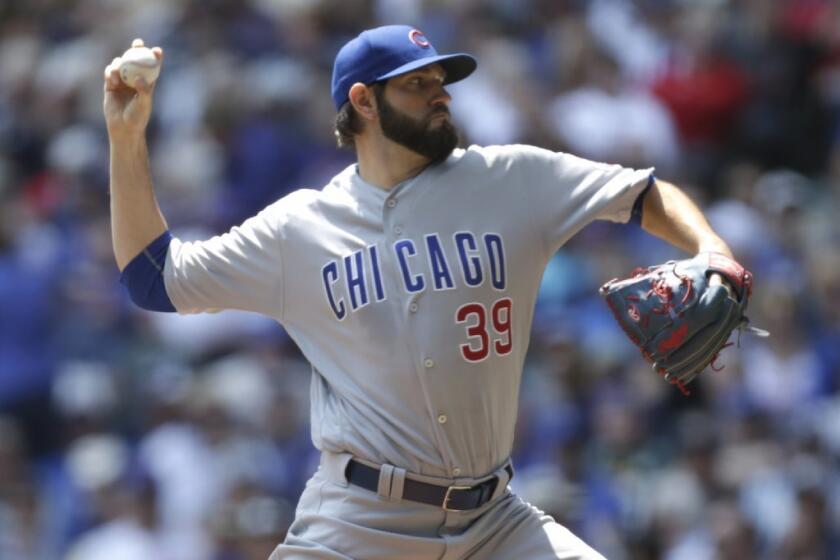 Cubs starting pitcher Jason Hammel (39) throws a pitch during the first inning against the Milwaukee Brewers on May 19, 2016.