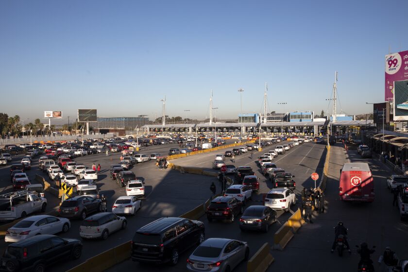 Tijuana, Baja California - November 15: On Tuesday, drivers in Tijuana heading to the San Ysidro Port of Entry, experienced a new check point that many felt created longer wait times on Tuesday, Nov. 15, 2022 in Tijuana, Baja California. Mexican officials announced the change last week where Mexican immigration officials would begin checking some travelers for the appropriate crossings documents before they reached the the U.S. Customs and Border Protection agents at the port of entry.(Ana Ramirez / The San Diego Union-Tribune)