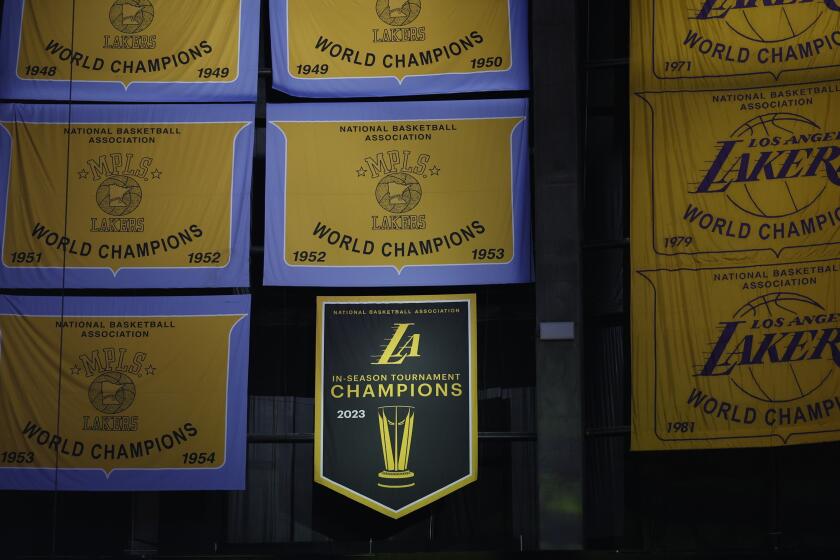Los Angeles, CA - December 18: Championship banner for the 2023 In-Season Tournament unveiled before the game between the New York Knicks and the Los Angeles Lakers at Crypto.com Arena on December 18, 2023 in Los Angeles, California.