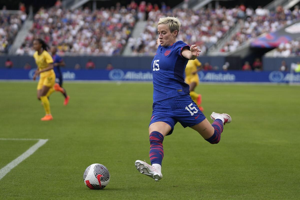 U.S. forward Megan Rapinoe passes the ball, but a goal is declared offsides.